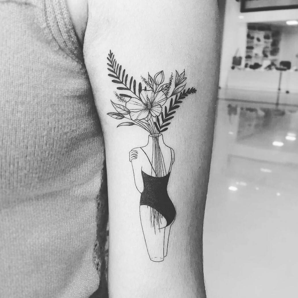 Female body with flowers as head